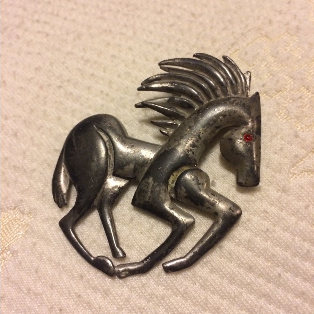 Antique horse brooch with red rhinestone detail